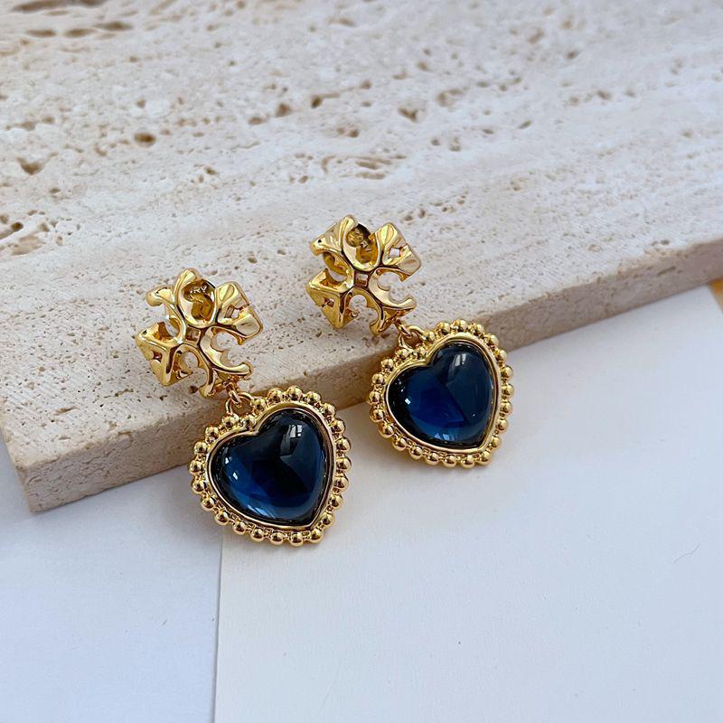 

European & American Fashion Luxurious Heart Shell Metal Earrings for Women синий