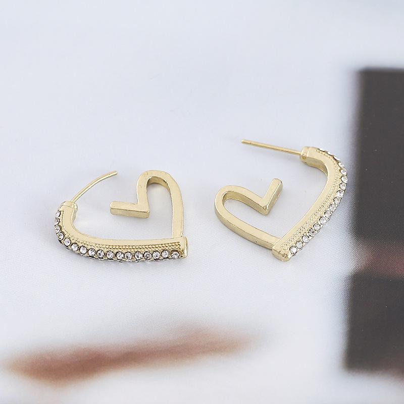 Trendy Love-Shaped Cubic Zirconia Stud Earrings – Stylish & Unique Design with High-End Appeal