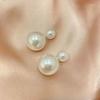 Pendientes de perlas de alta gama de moda Pendientes retro de nicho francés de lujo ligero Pendientes de perlas simples y versátiles para mujer