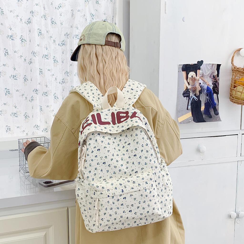 Schoolbag schoolbag female junior high school student high school student campus large capacity double shoulder floral letter ins style high niche
