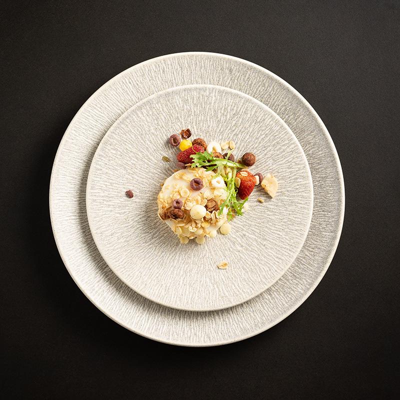 Einfacher Steakteller Runde Keramikteller Haushalts-West-Teller Restaurant Hotel Flacher Teller High-End-Teller