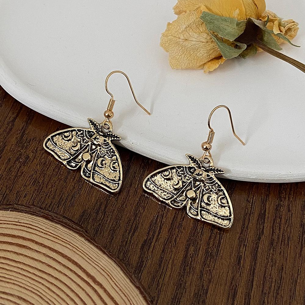 2025 Gothic Sun & Moon Moth Earrings – Retro Alloy Ethnic Fashion Ear Hooks for Women