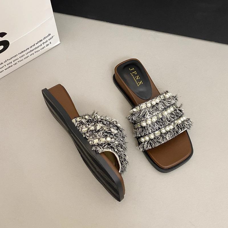 

Slippers women wear summer and summer new versatile cute one-word flat-bottomed seaside cool slippers 40