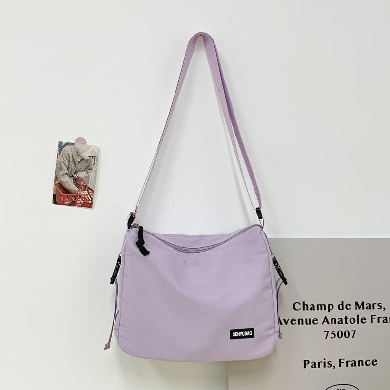 

Crossbody Bag Women S Trend Large-Capacity Ultra-Light Bag Mori Mailman Bag Men S Casual Shoulder Bag фиолетовый