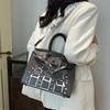 New high-end contrasting smiley face platinum bag portable shoulder oblique span women's bag
