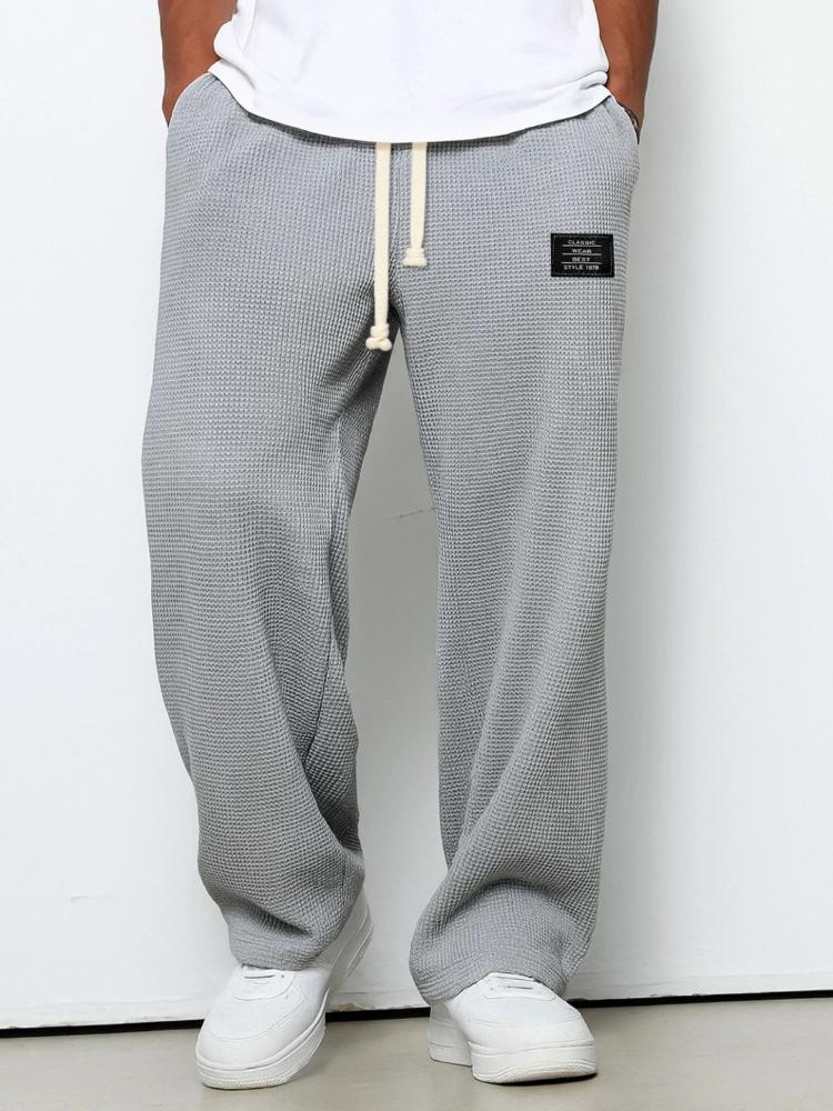 Pantaloni della tuta casual sportivi a gamba dritta in maglia waffle con elastico e coulisse a vita media