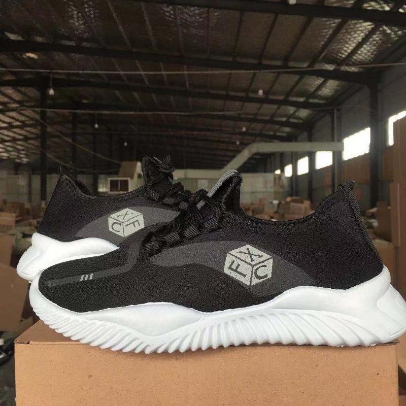 New men's casual shoes breathable sports running shoes soft sole comfortable lightweight flying woven shoes