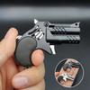 1 Pezzo Mini Portachiavi Metallo Elastico Giocattolo Pistola Gioco Pistola Lanciatore Pistola Simulazione per Adulti Giocattoli Regali Ciondolo
