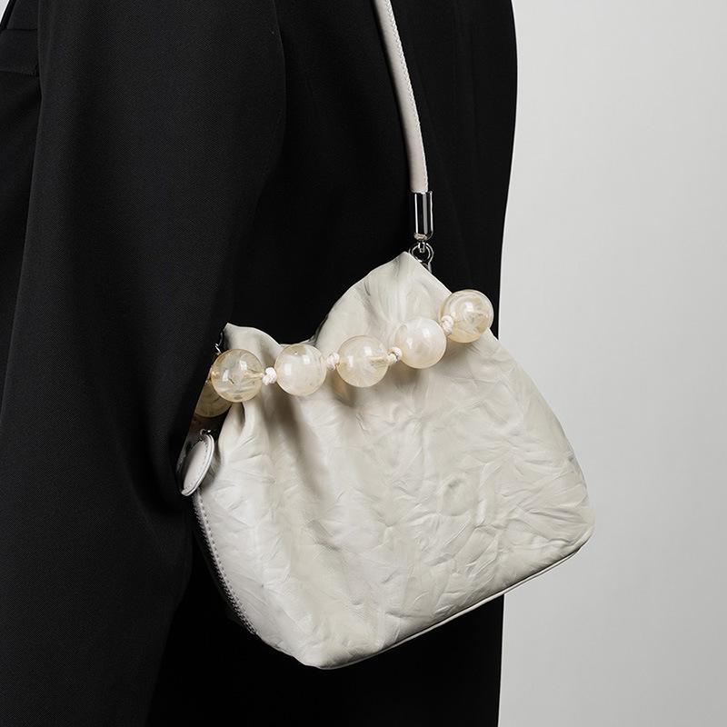 Elegant Chinese Style Beaded Cowhide Handbag - Unique Hand-Scratched Pattern, Perfect as a Lunch Box or Clutch.