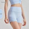 Bare-Feel High-Waisted Yoga Shorts: Butt-Lifting, Peach Drawstring, Three-Quarter Fitness Pants for Women.