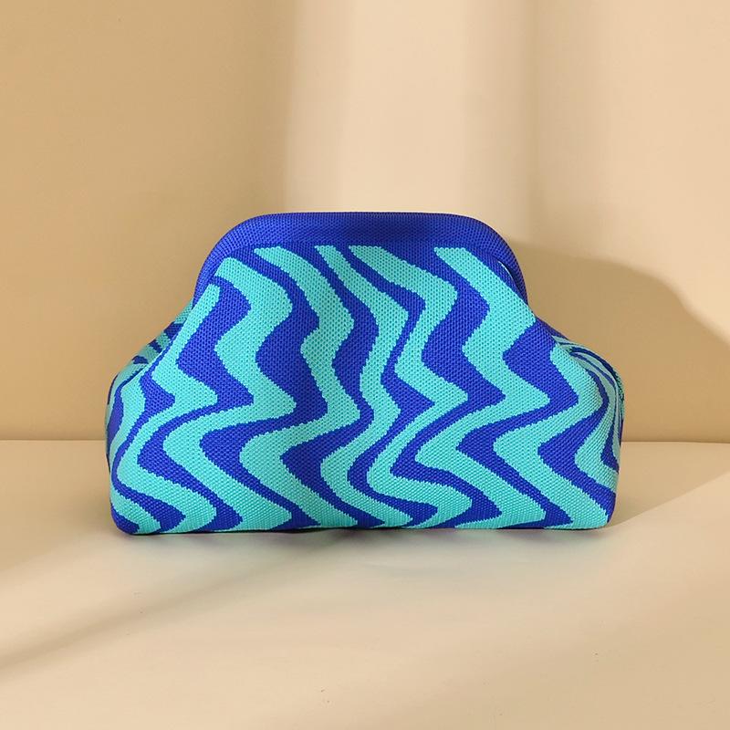 Knitted bag, striped clutch bag, women's flying woven clouds, versatile temperament, portable cosmetic bag, large capacity