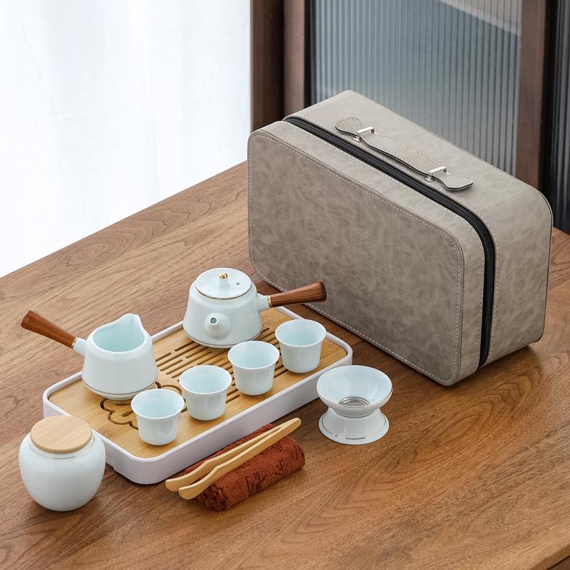 Jade Green Travel Tea Set: One Pot, Four Cups, with Wooden Side Handle and Tea Caddy.