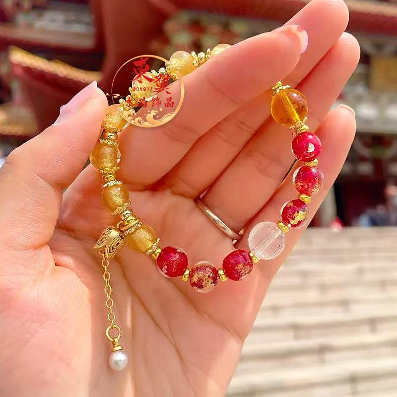 Yellow-Red Gold Foil Heart Sutra Bead Bracelet with White Crystal, Yellow Jambhala Mantra, and Ash-Glazed Porcelain.