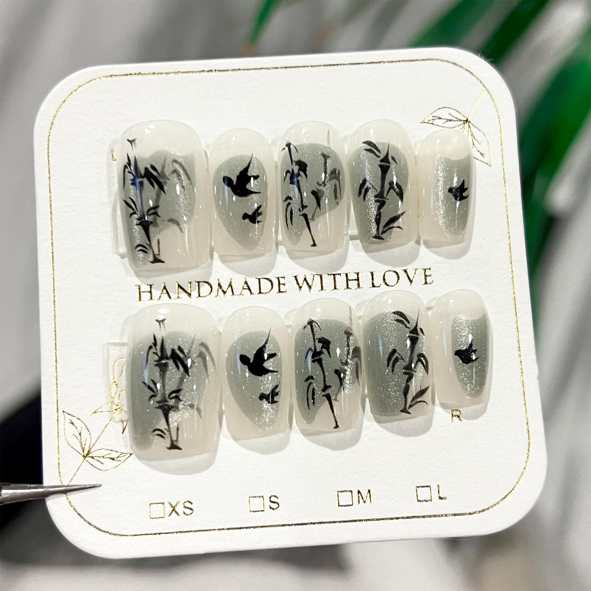

Cat s eye advanced sense of national style bamboo leaves wearing armor semi-manual sub-code manicure fake nails Xiaohongshu explosive nail film M