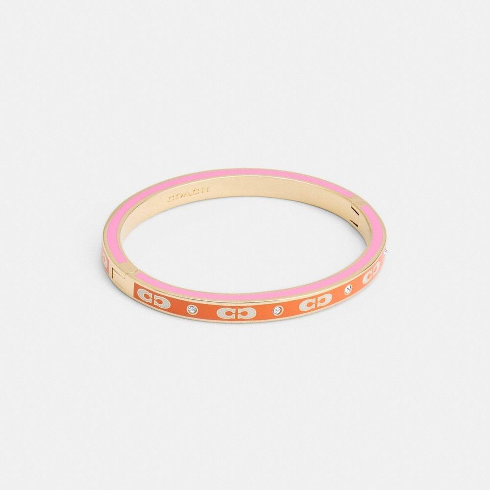

Браслет COACH Signature Enamel Hinged Bangle CV259 UJH Gold Orange Marl