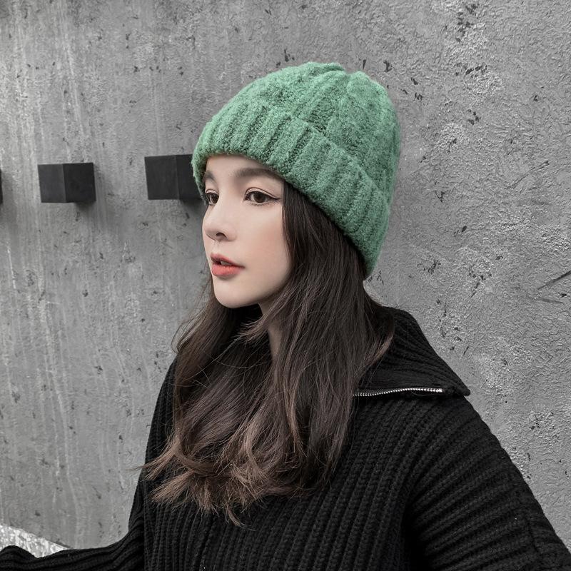 Classic versatile hat women's autumn and winter tide warm thickened ear protector winter women's foreign style knitted wool hat