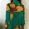 The Lady's Long-sleeved Button-down Shirt Features a Green Butterfly Flower Design with Exquisite Insect Patterns, Making It Perfect for a Date.