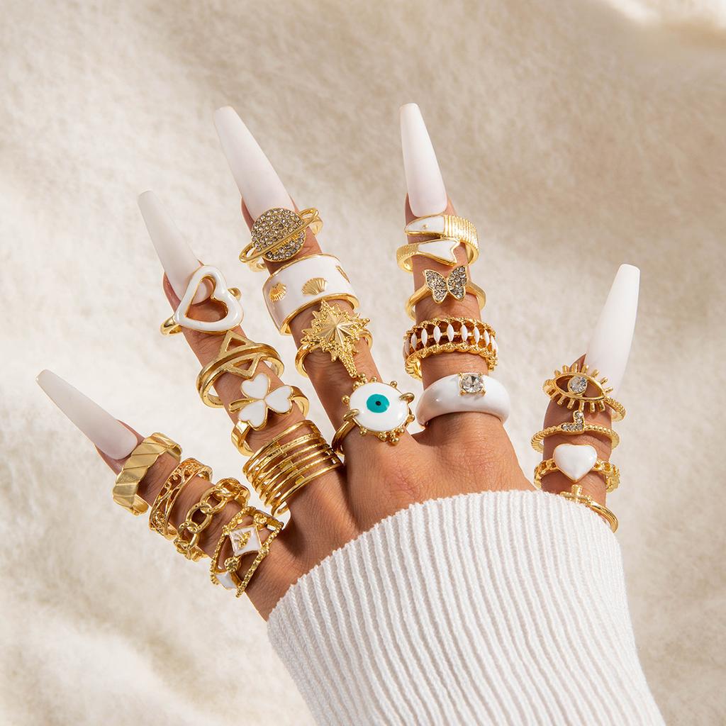 Vintage metal imitation emerald diamond ring set design sense love snake ring set women