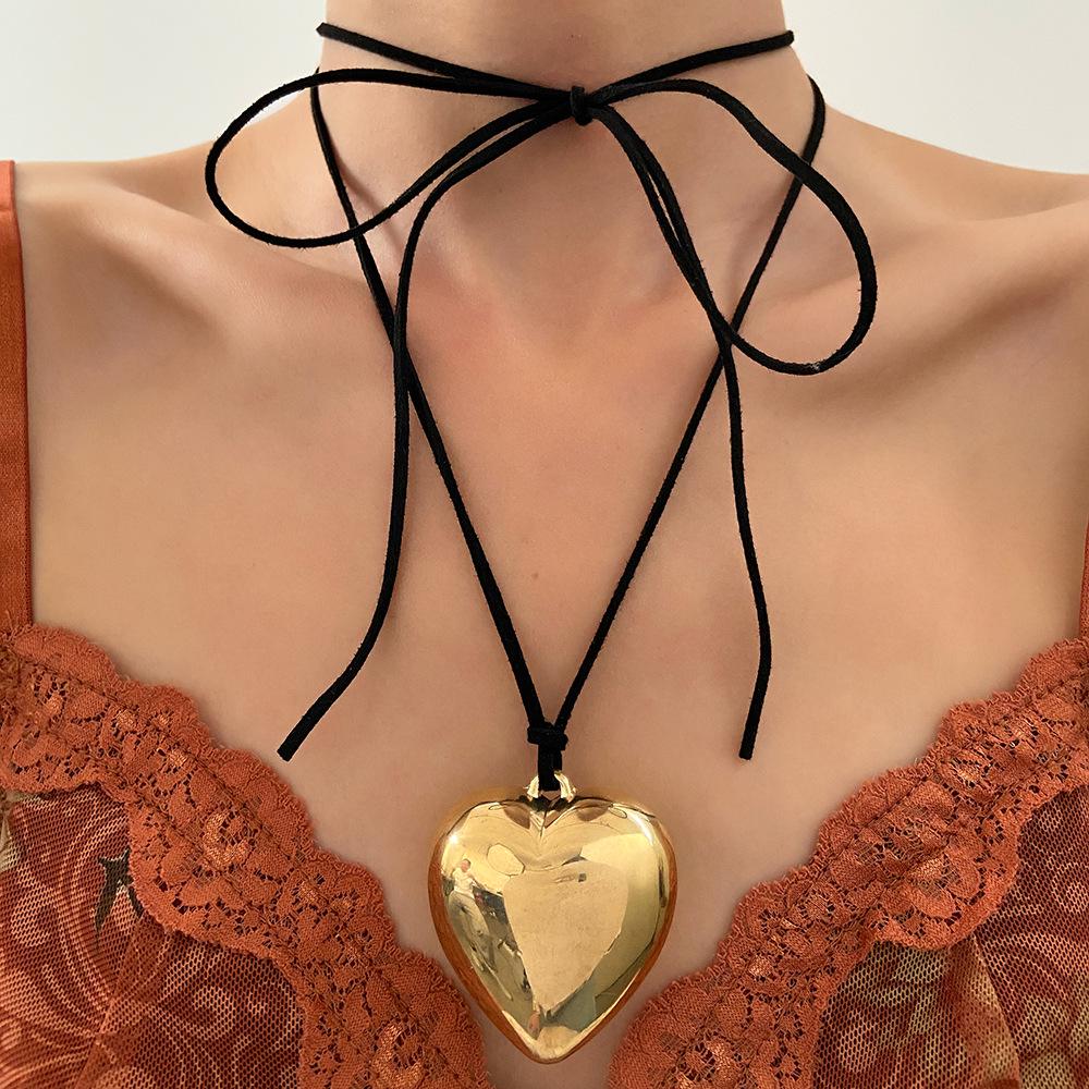 Exaggerated Heart Pearl Necklace with Irregular Hollow Design for Women