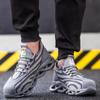 Nuove scarpe antinfortunistiche da uomo Stivali da lavoro con punta in acciaio Sneakers da lavoro leggere Calzature da uomo antiforatura