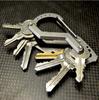 Multifunctional EDC Carabiner Key Holder with Quick-Release Strap and Protector, Stainless Steel Mountaineering Buckle Keychain.