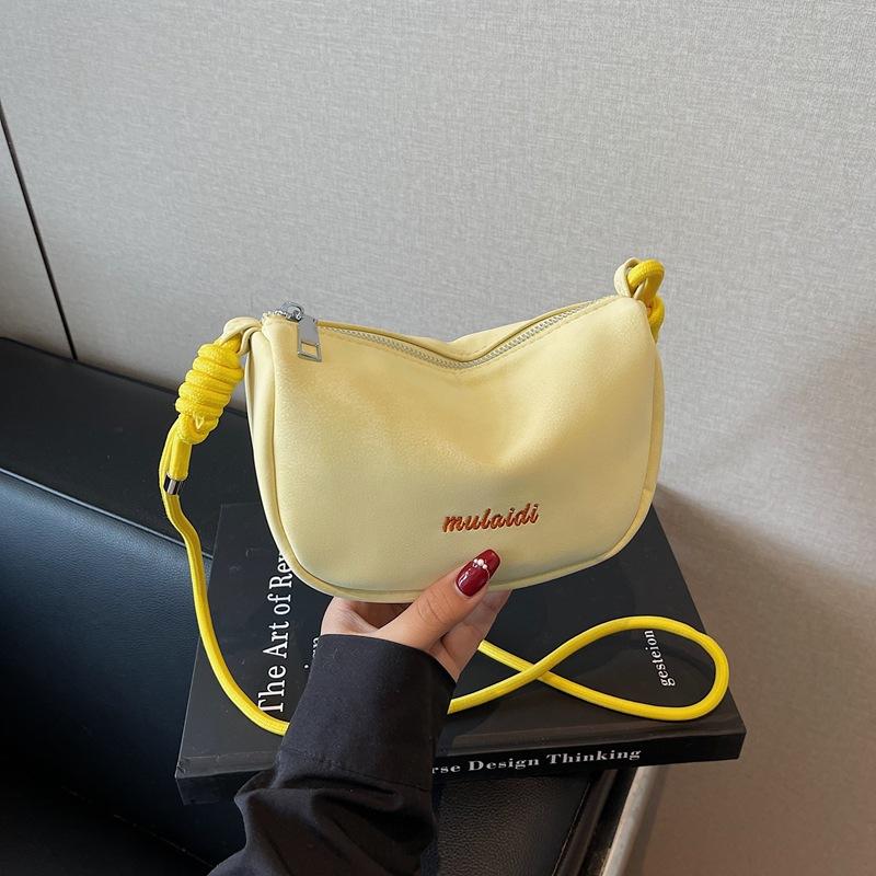 

Niche design bag women s new fashion summer shoulder messenger bag saddle bag жёлтый