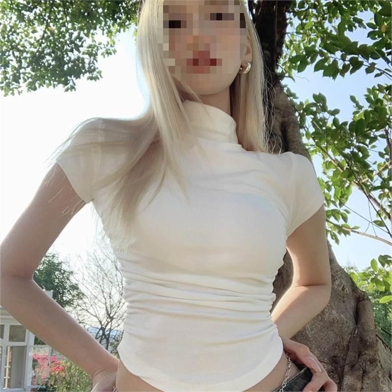 

Білий топ-кроп з високою горловиною та рюшами - Приталений крій, короткий рукав, асиметричний дизайн плеча для жінок Extra Large чорний