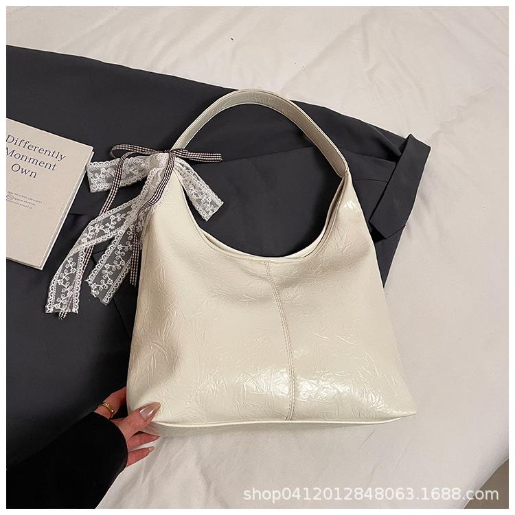 

Retro niche bag women 2025 new commuter versatile large capacity shoulder armpit bag fashionable messenger dumpling bag белый