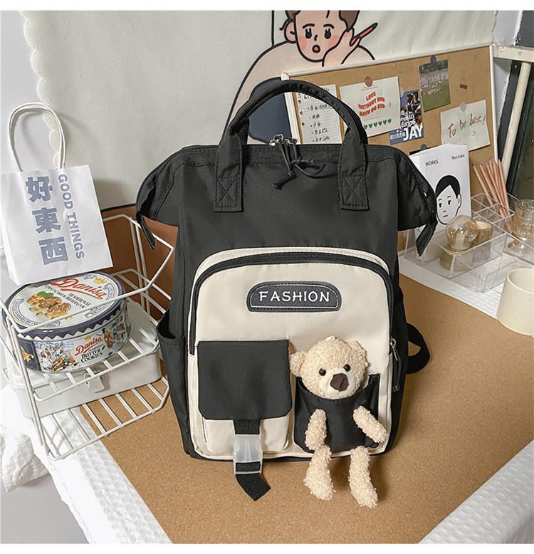 

Solid color backpack women s 2025 new lightweight large-capacity schoolbag versatile nylon travel bag commuter small backpack чёрный