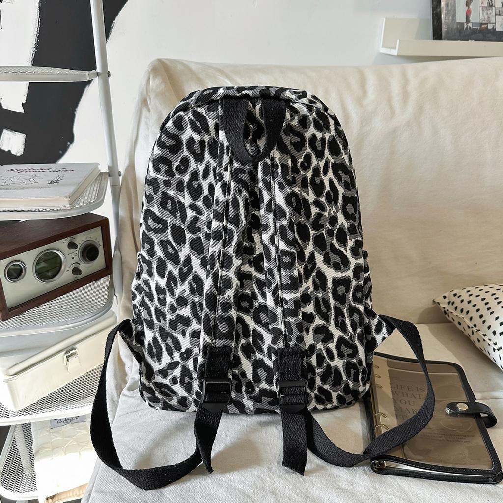 Leopard Print Backpack Casual Daily Use Trendy Street Style Lightweight Backpack for Women with Tassel Detail for School Travel and Everyday Outings