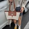2025 new versatile contrasting color canvas leather splicing personalized retro large-capacity handbag tote bag