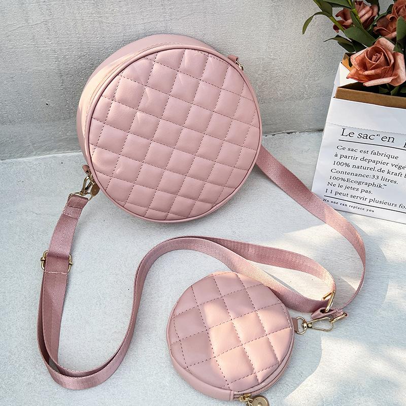 Bag women's new solid color rhombus embroidered messenger small round bag with change small bag fashionable one