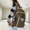 Simple student schoolbag Female high school student Junior high school student backpack Large capacity couple backpack