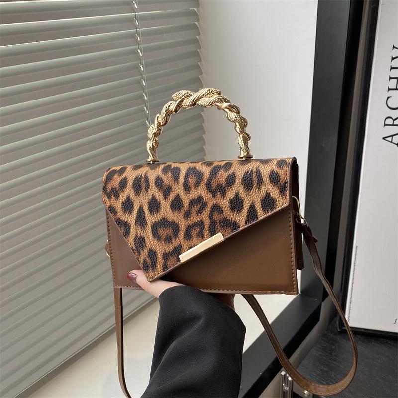 

Summer new niche design leopard print fashion casual shoulder armpit bag personalized trend messenger bag коричневий