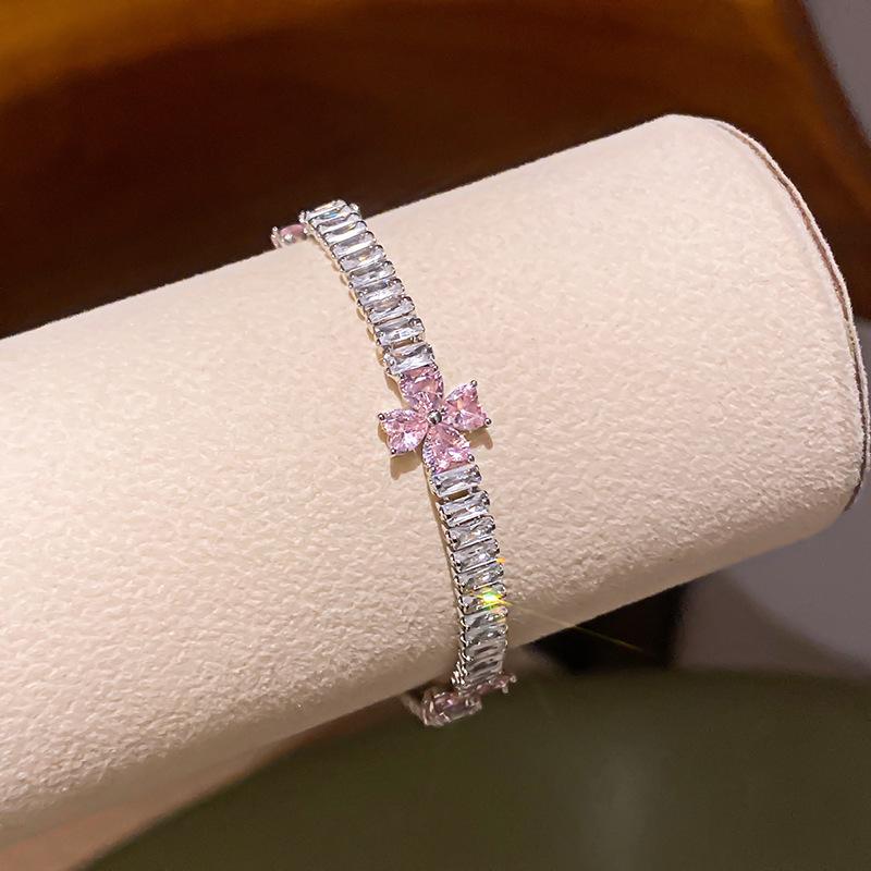 Pink Diamond Zirconia Starburst Flower Bracelet: Trendy, Luxurious Jewelry with Unique Design.