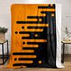Orange elongated bars and circles merge into a black background diagonally. for all seasons blanket lunch break throw gift