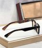 CASABLANCA Unisex Photochromic Handmade Acetate Sunglasses - Fashionable for Vacation, Party, or Casual Wear.