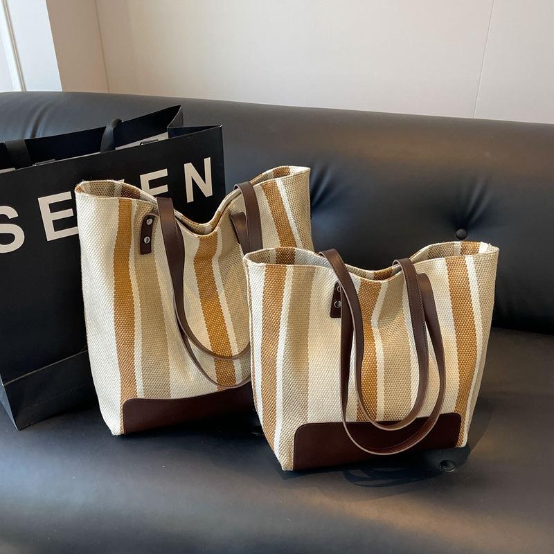 New Trendy Women's Striped Shoulder Bag Fashionable Casual Large Capacity Handbag Texture Commuter Armpit Tote Bag