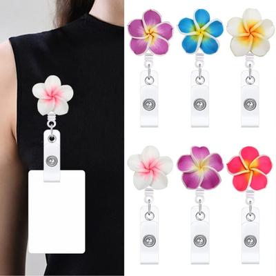 Neuer Polymer-Ton-Abzeichen-Rollen-Kartenhalter Blumenform Ausziehbarer ID-Karten-Abzeichen-Clip Abzeichenhalter-Clips Krankenschwestern-Bedarf