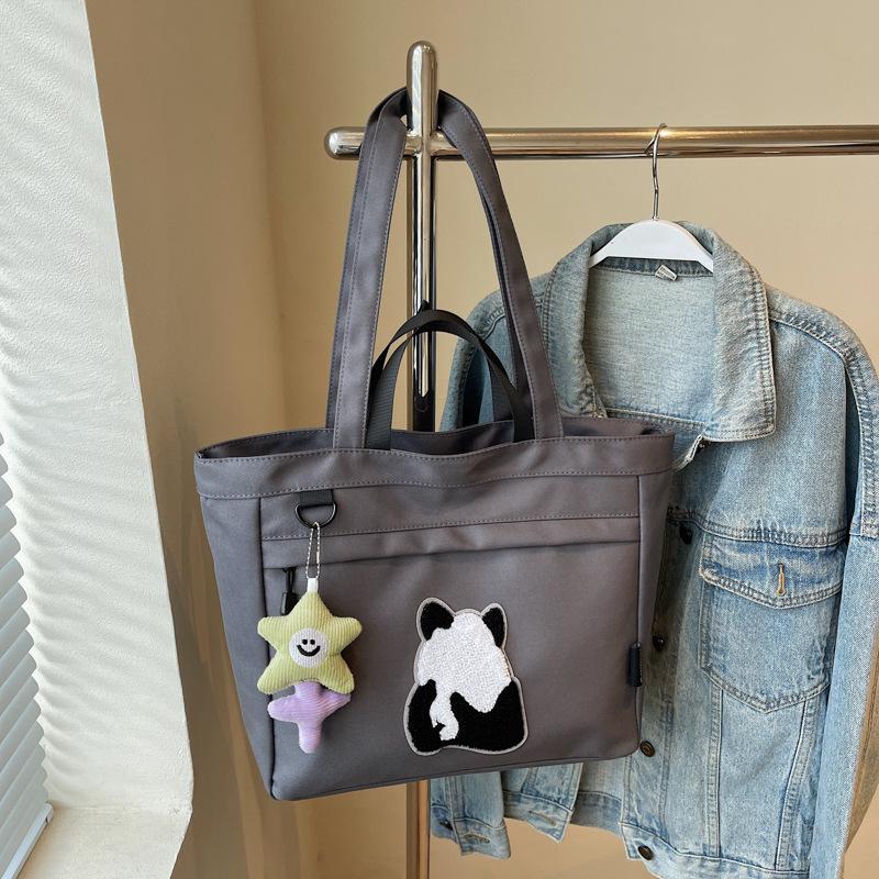 Spring canvas large-capacity messenger bag for women 2025 new trendy cartoon panda print shoulder tote handbag for women
