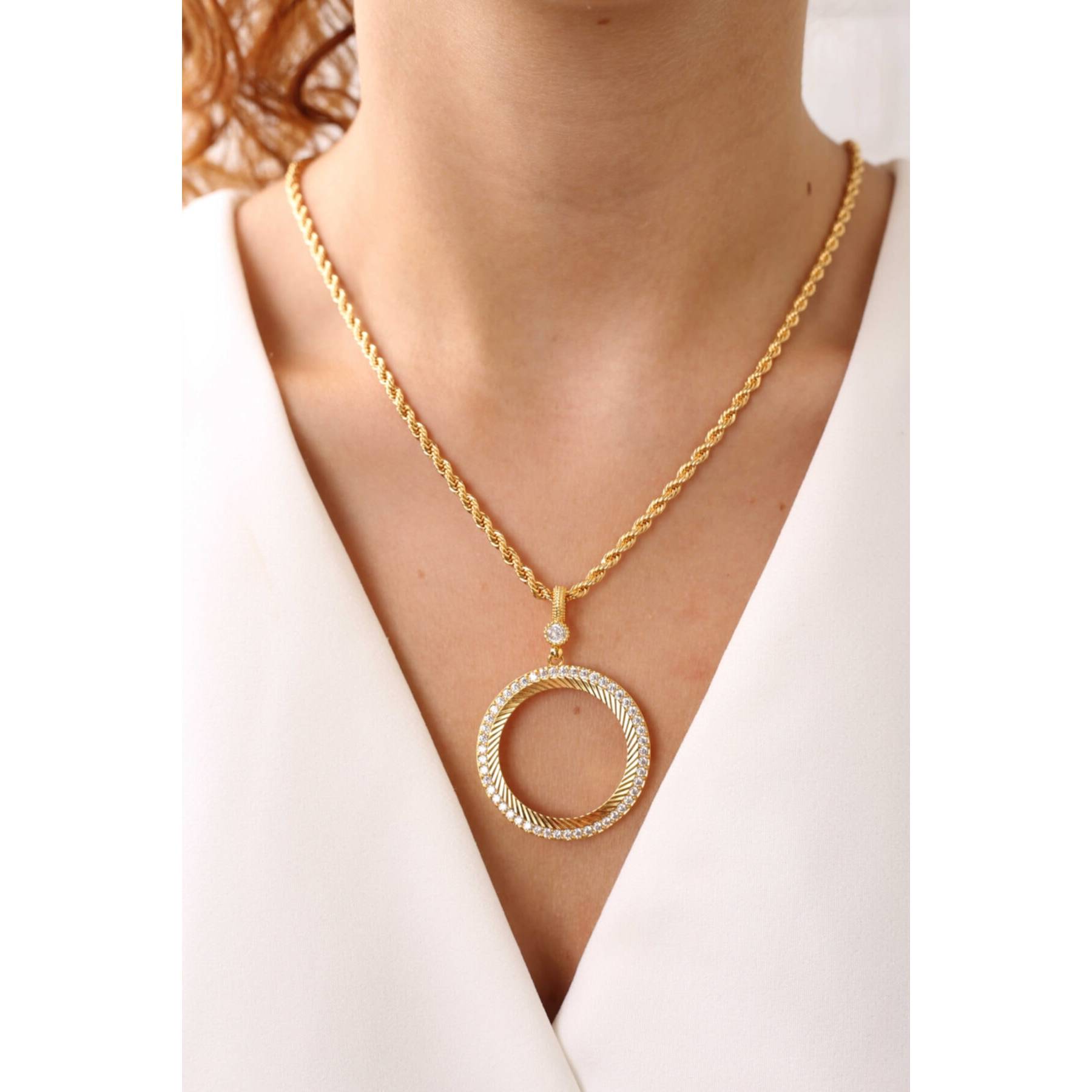 

Ожерелье Tugra с полностью золотым безелем из 22-каратного золота