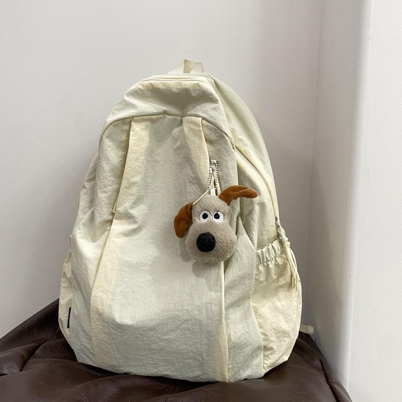 Travel lightweight advanced sense niche backpack college student commuter junior high school girls schoolbag Japanese and Korean simple backpack