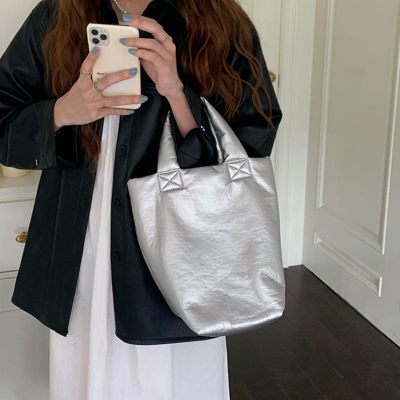 

Waterproof new niche design fashionable soft leather texture silver handbag bucket