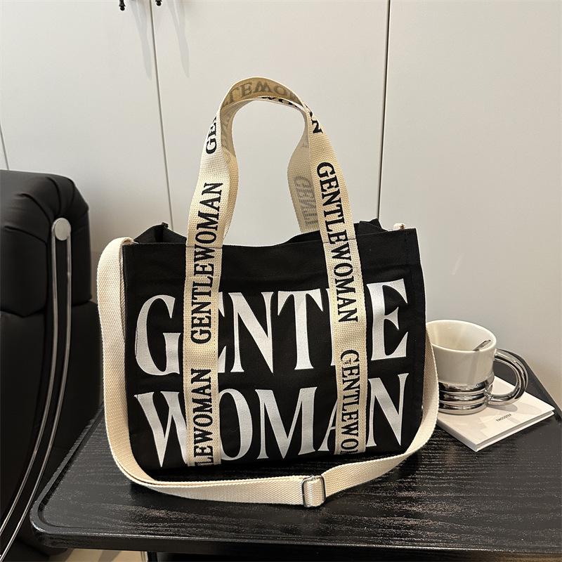 2025 Women's Color-Blocking Canvas Handbag: Trendy Crossbody & Shoulder Bag with Colorful Strap