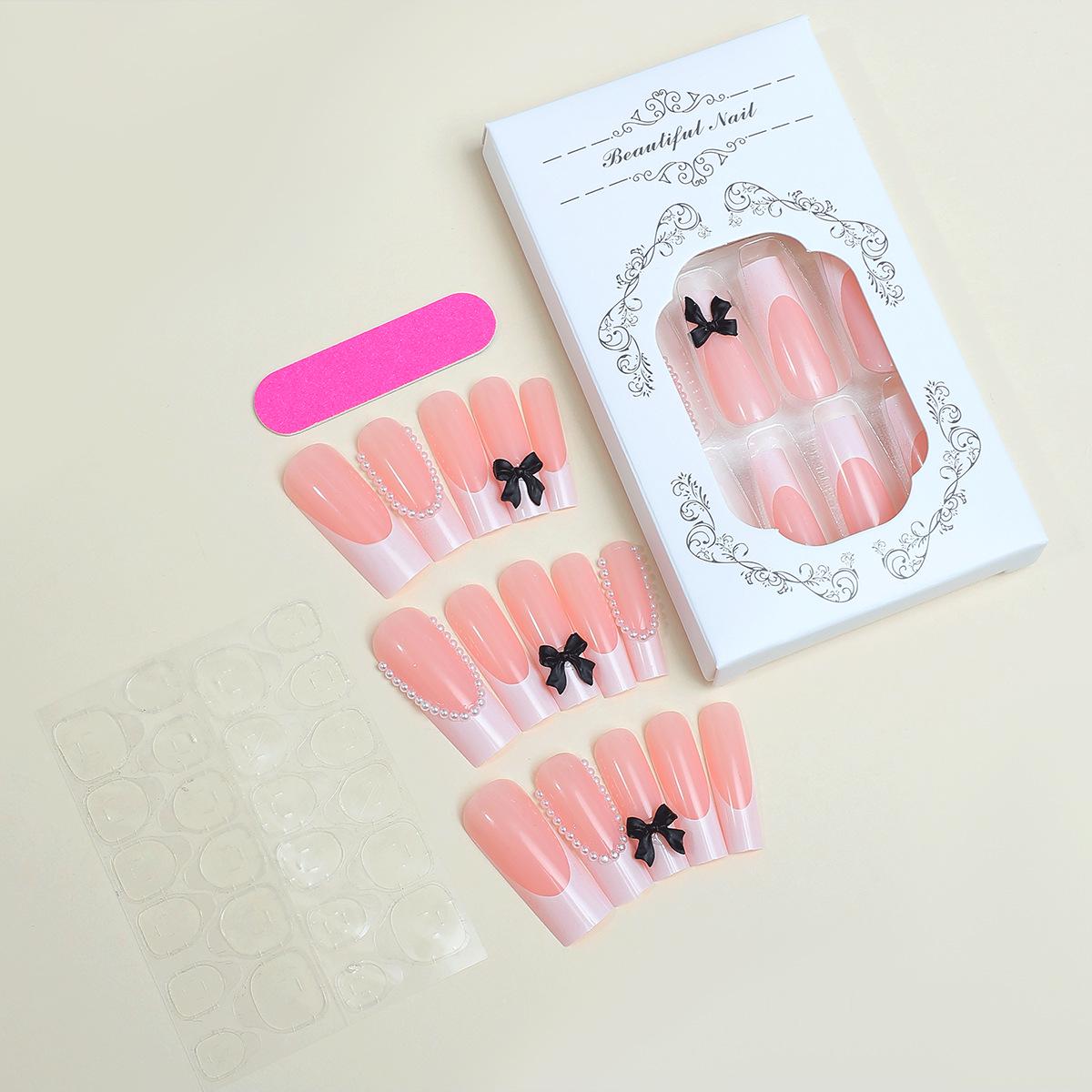 

Длинные накладные ногти френч с жемчужным бантом и съемным дизайном