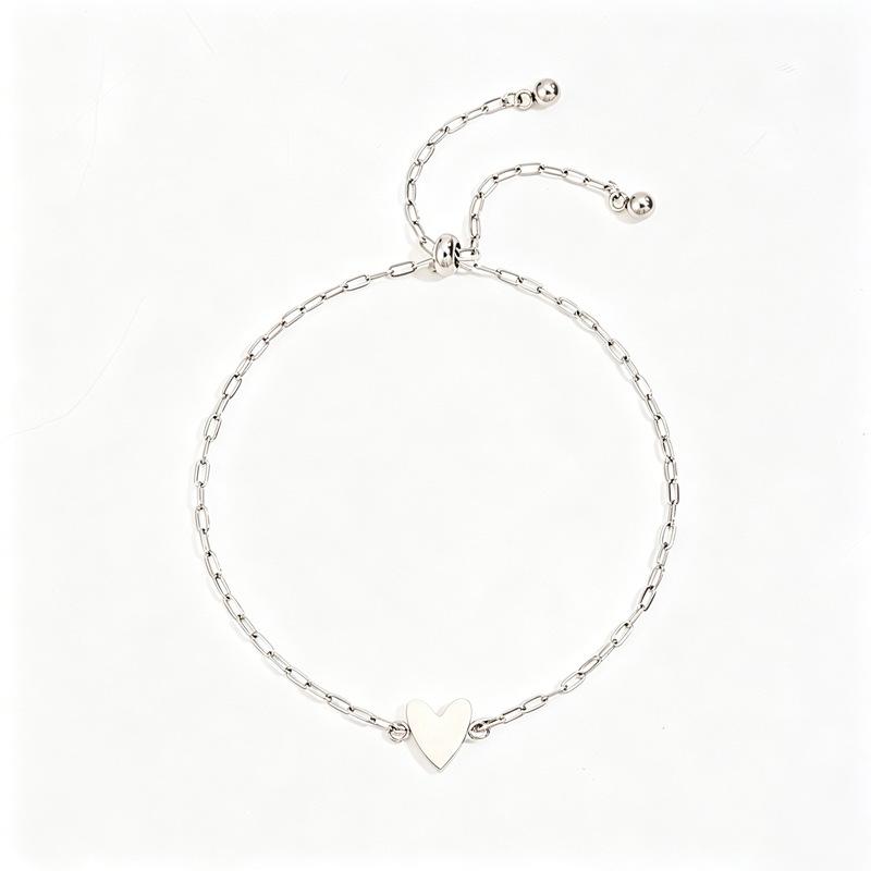 Simple and non-fading titanium steel hollow pull love couple advanced sense two-piece set casual versatile