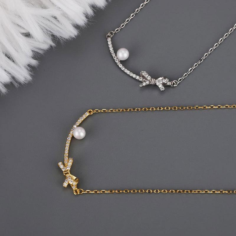 Smiling Bow Pearl Necklace French Retro Temperament Elegant Clavicle Chain Year Trendy