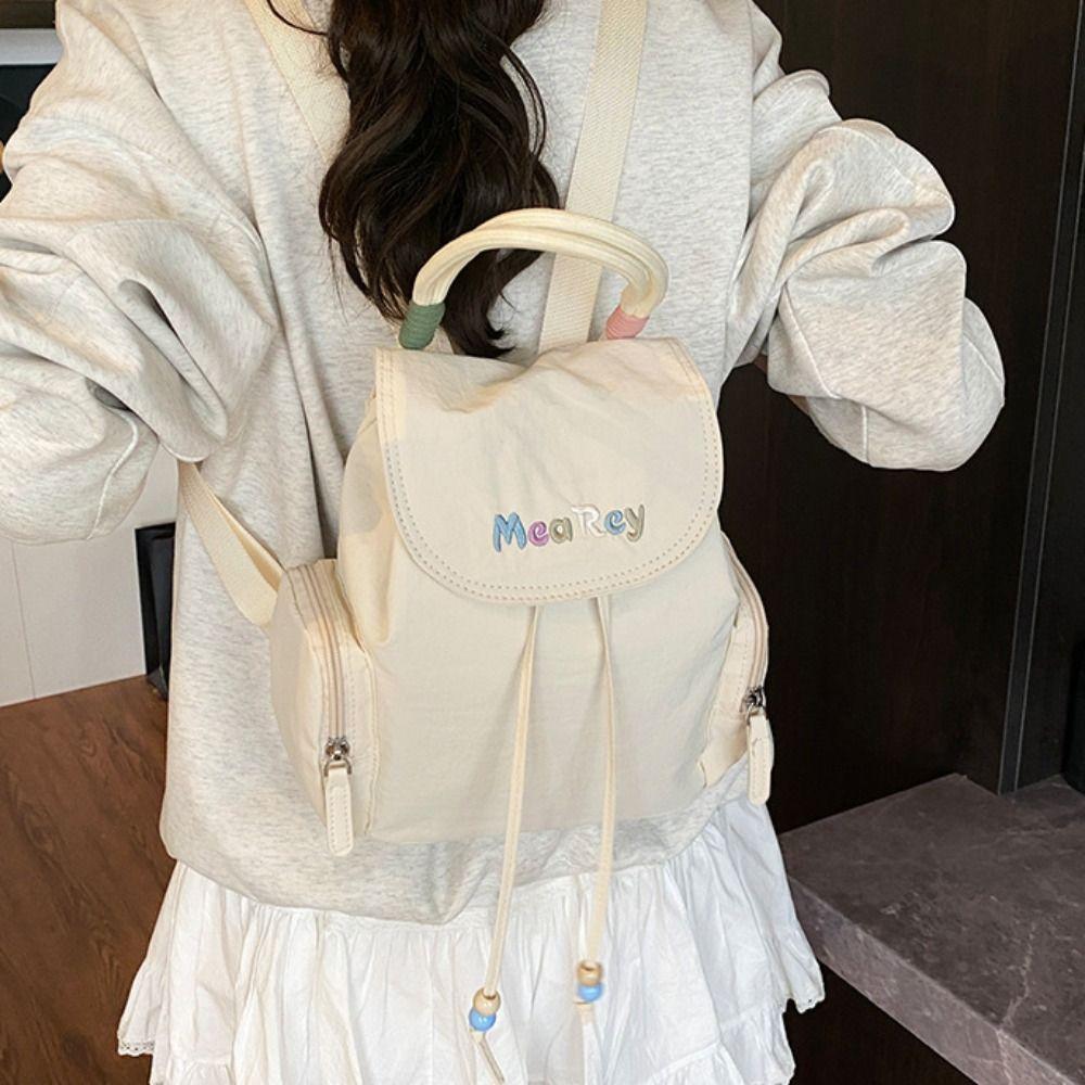 

Nylon Students School Bag Letter Embroidery Shoulder Bag Portable Drawstring Backpack Travel рожевий