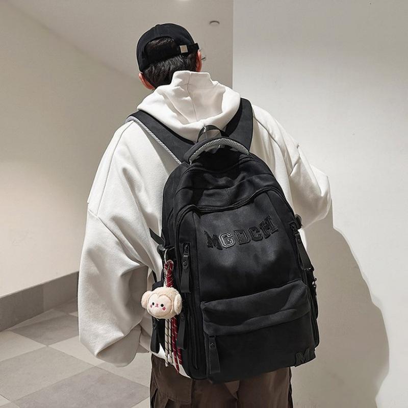 Lightweight, Ergonomic School Backpack for Male and Female Teens, Featuring Large Capacity, New Style, Double Shoulder Straps, and Back Protection.