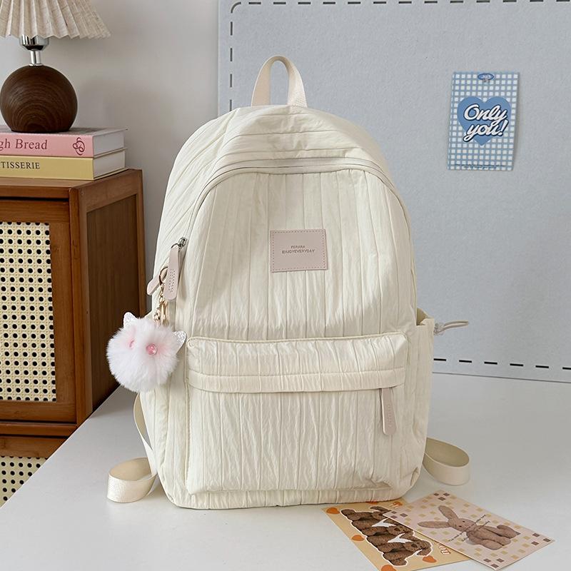 School bag junior high school girls large capacity solid color light primary school backpack high value girl versatile backpack